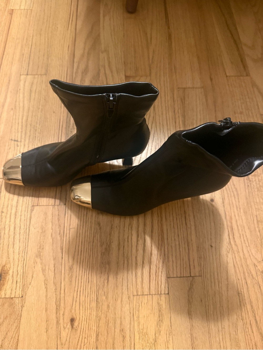 Dolce Vita Black Ankle Booties with Gold Cap Toe